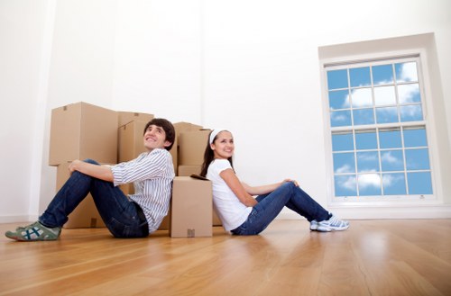 Careful handling of desks and electronics during a Castelnau office relocation